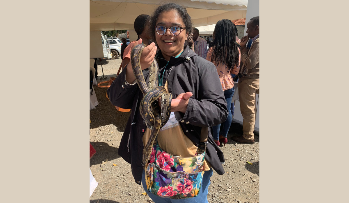 Nazifa holding a snake