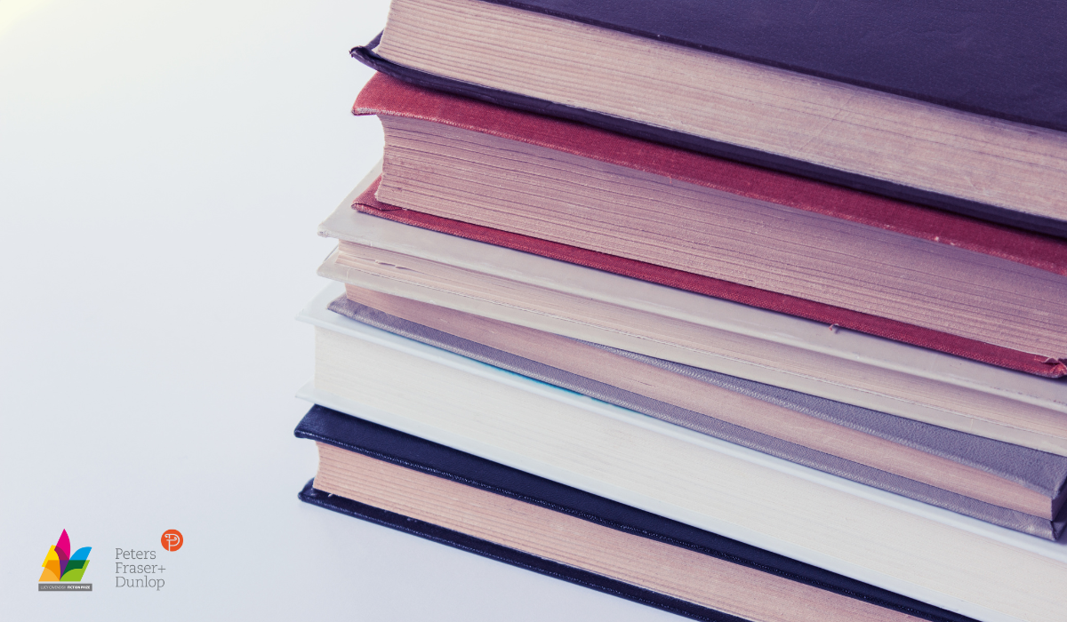Close up of six books stacked on white background