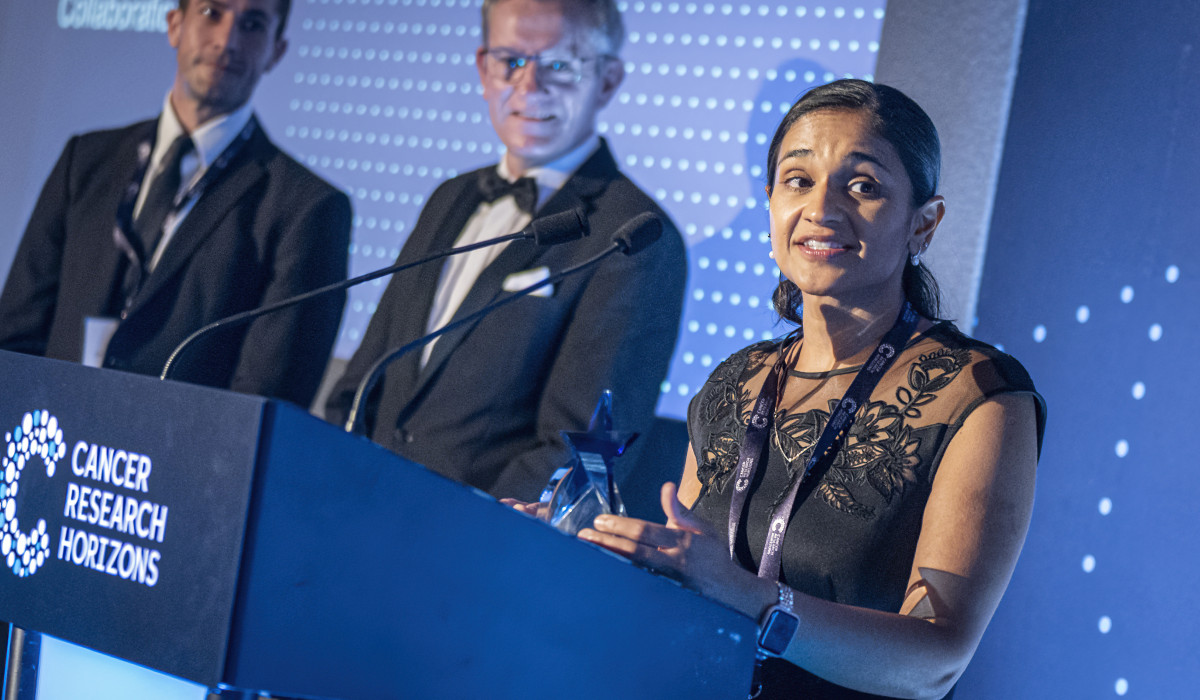 Dr Aditi Vedi givinfg a speech at awards ceremony