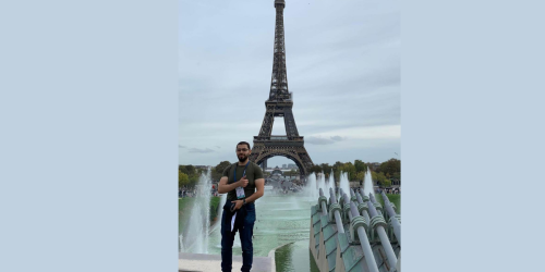 Omar in front of Tour Eiffel